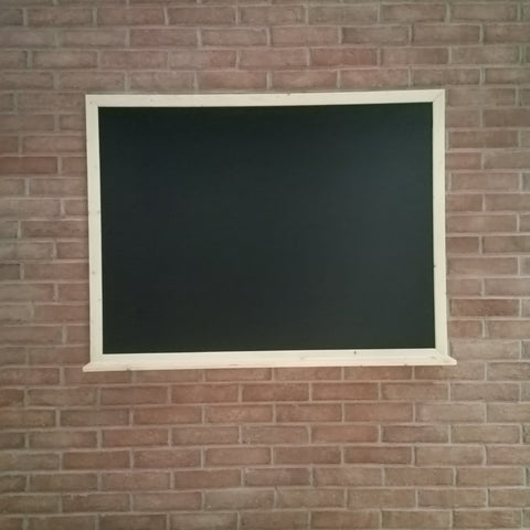 Black Board front on stone wall